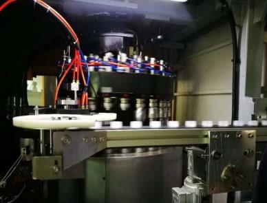 Cap compression machine